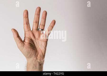 Man`s hand gesture, counting number five, isolated on white background Stock Photo
